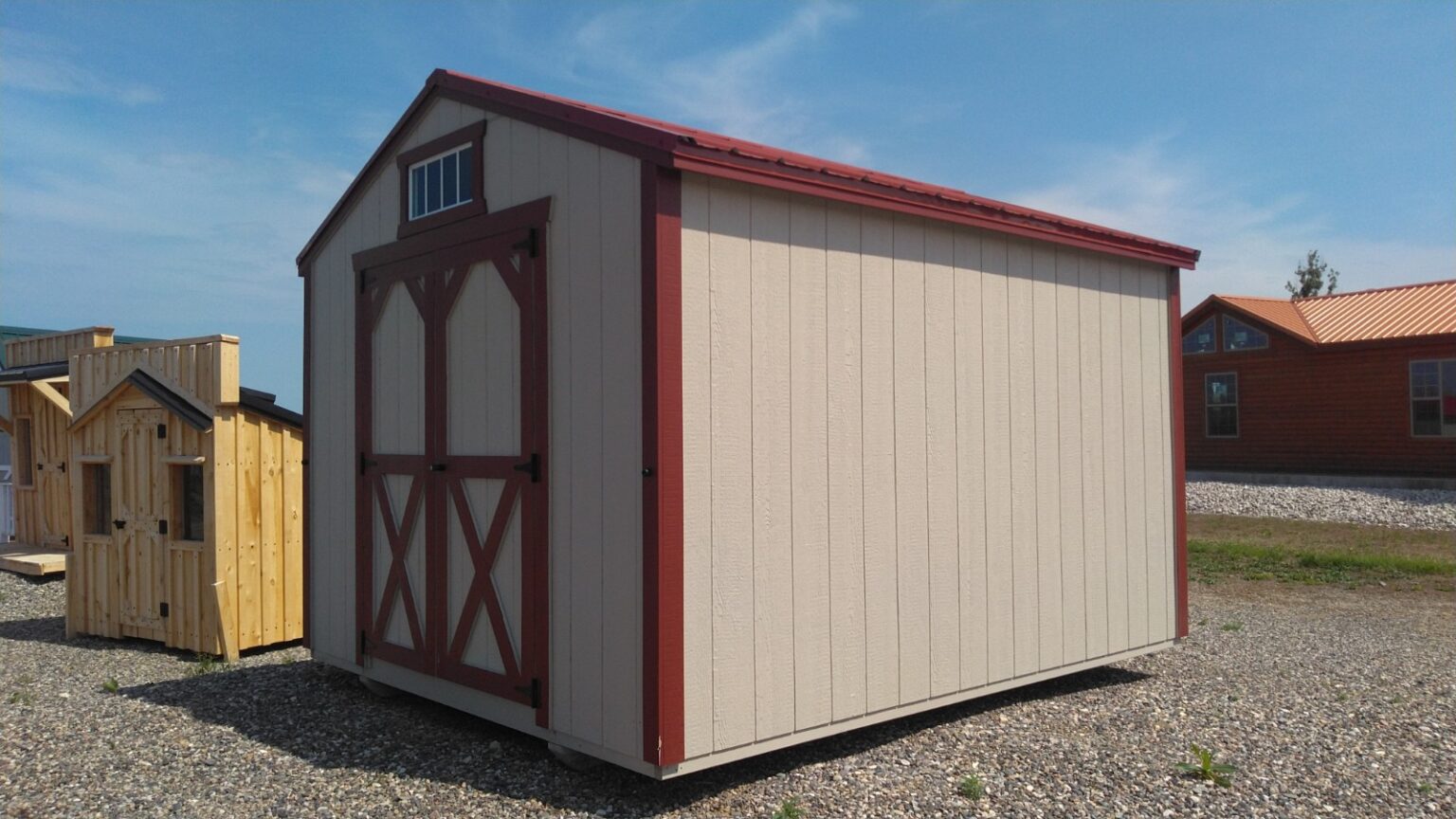 Silver maple and red 10x12 garden shed.