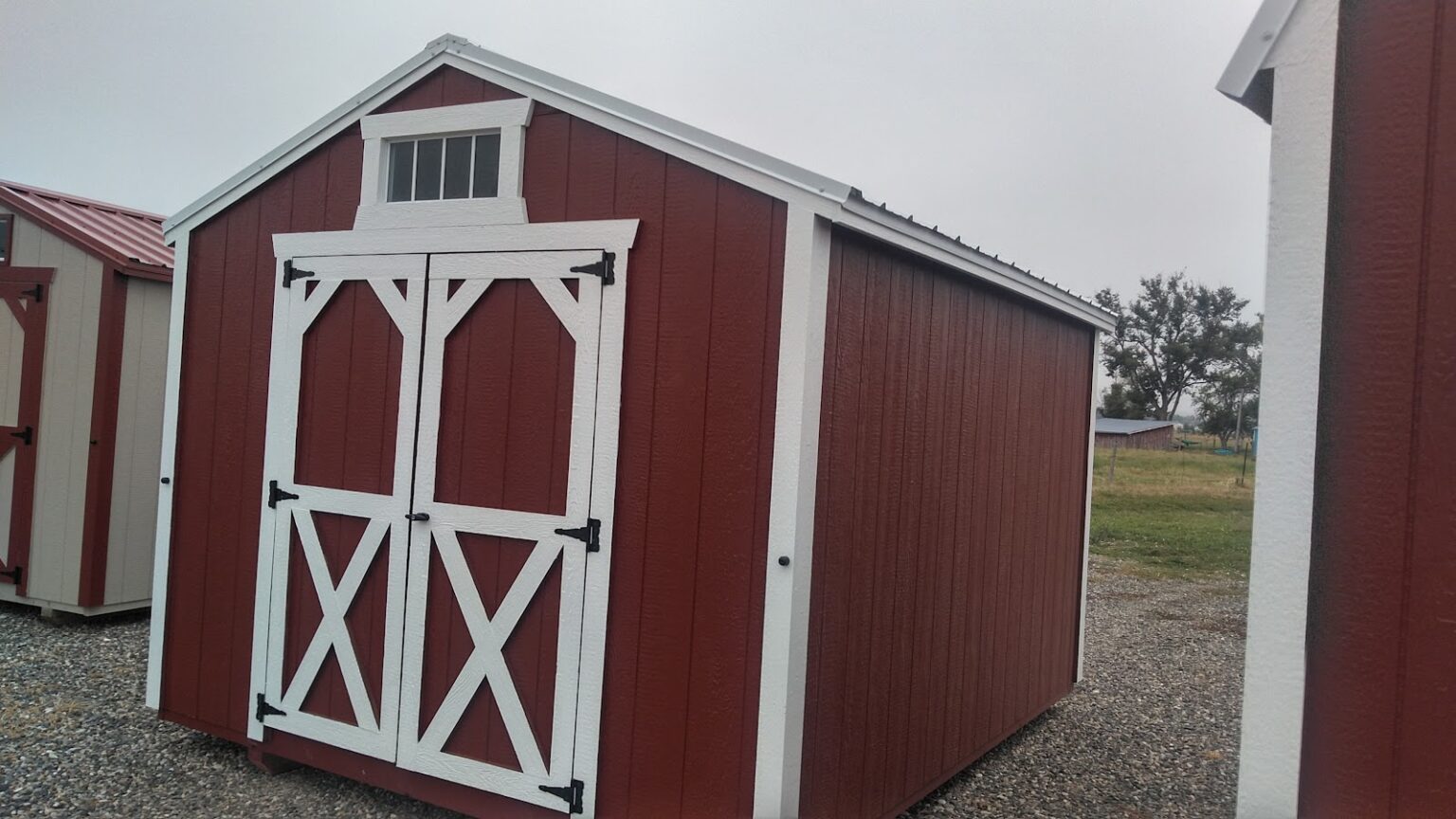 Red and white 10x12 garden shed.